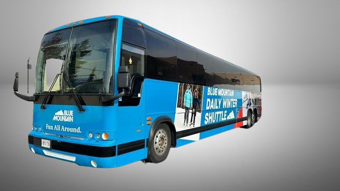 Blue Mountain daily winter shuttle bus featuring full vehicle wrap by Toronto Car Wrap experts