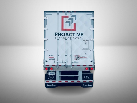 Rear view of a branded commercial truck featuring Proactive Transportation logo and vinyl wrap design, showcasing custom fleet graphics by Toronto Car Wraps.