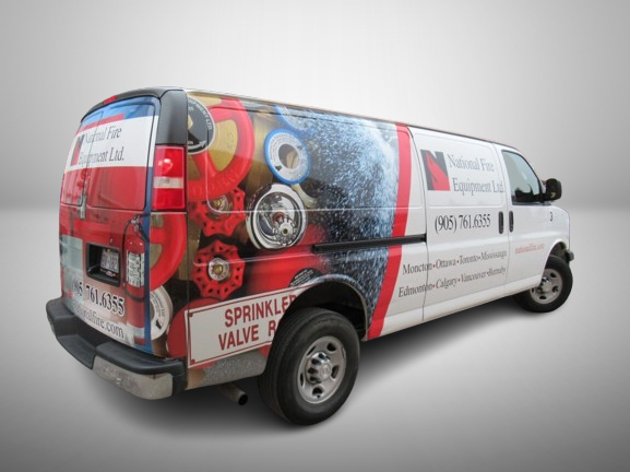 Custom commercial van wrap for fire safety equipment company by Toronto Car Wraps, featuring branded graphics and contact details.