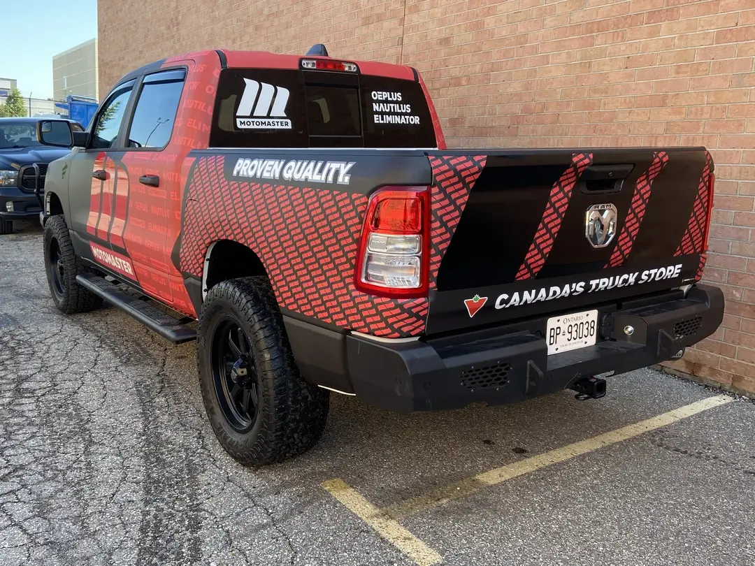 Custom Motomaster RAM truck wrap with Canadian Tire branding and fleet graphics by TorontoCarWrap.com in Toronto