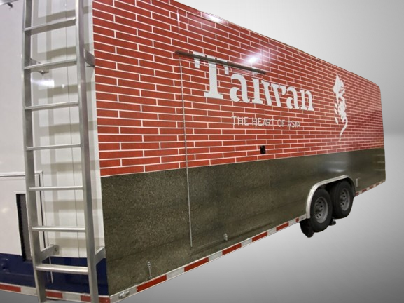 Taiwan-themed promotional trailer wrap with custom brick design by TorontoCarWrap.com for cultural events in Toronto