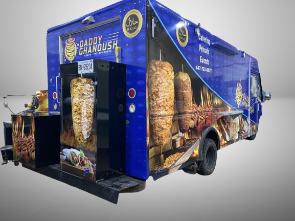 Custom food truck wrap for Daddy Chanoush Halal Shawarma in Toronto featuring high-resolution branding and mobile catering graphics by Toronto Car Wrap
