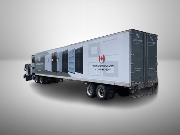 Full-length trailer truck with Upwardor custom vinyl wrap showcasing garage door products, designed and installed by Toronto Car Wraps for mobile brand visibility.